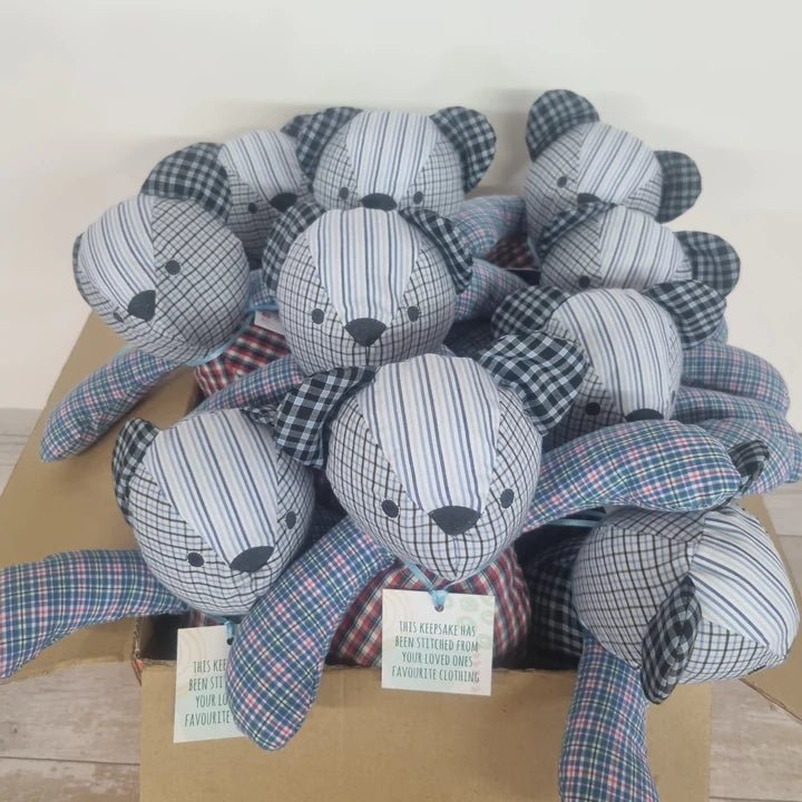 Making teddy bears out top of a loved one's clothes